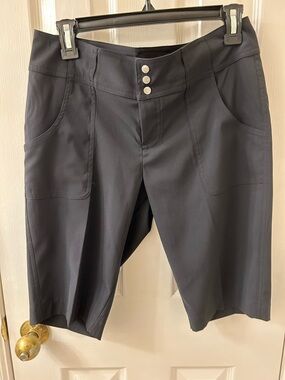 Jofit Black Mid-Length Stretch Shorts with Button Front